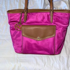 Michael Kors hot pink work bag.